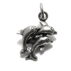 DOLPHINS IN MID-JUMP CHARM IN 3D STERLING SILVER.